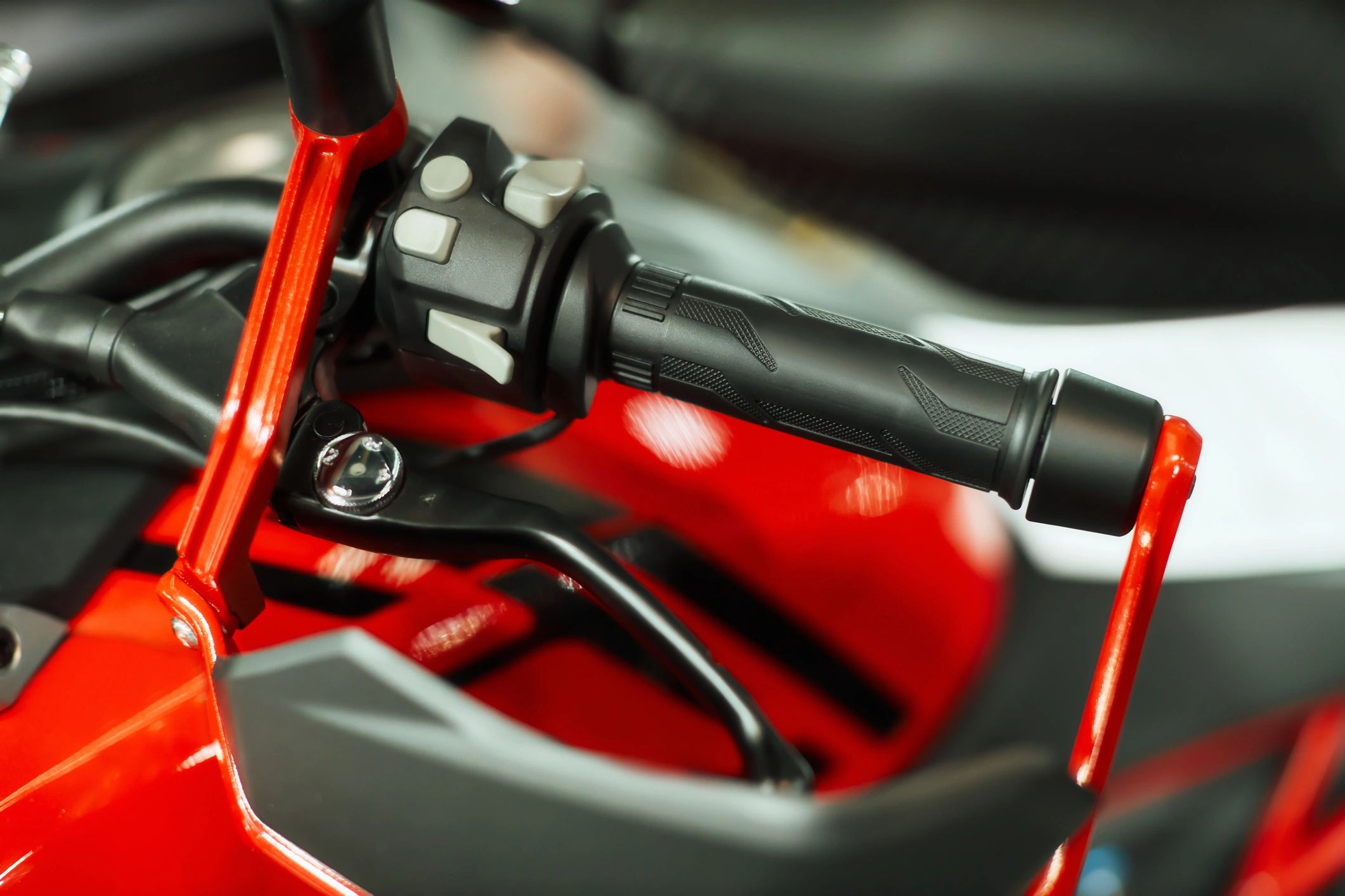 Close-up detail of a retro-style motorcycle handlebar